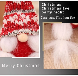 Close-up of knit texture and long white beard on a Christmas gnome ornament