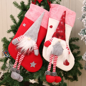 Christmas stockings set with long-legged gnome gnomes and heart patches on pine branches