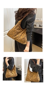 Detailed view of large leopard print hobo bag with durable brown leather shoulder strap