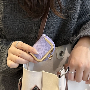 Mini purple litchi leather kiss-lock coin purse with gold frame and long strap
