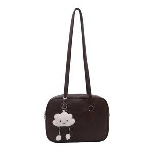 Dark brown leather shoulder bag featuring a cute white cloud plush pendant accessory