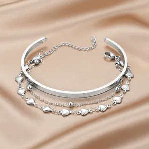 Three-layer silver stainless steel jewelry set with heart pendant and open cuff bangle