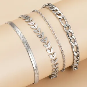 Set of four silver stainless steel bracelets featuring snake and wheat chain textures