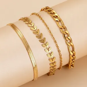Set of four gold-plated stainless steel bracelets featuring snake and wheat chain designs