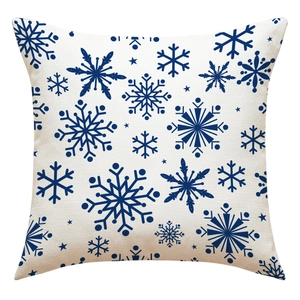 Linen Christmas pillow case with blue snowflake pattern on a beige square cushion cover