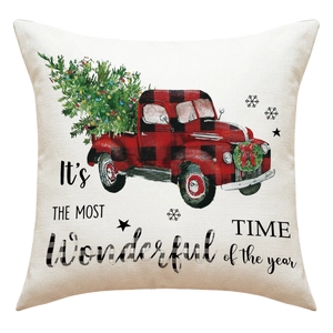 Détail de la taie d'oreiller de Noël avec camion rouge et texte décoratif festif