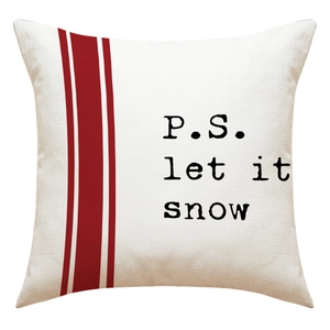 Close-up of snowflake let it snow print and linen texture on Christmas pillow case