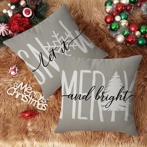 Set di 2 federe per cuscini natalizi grigi con fiocchi di neve e scritte festive