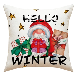 Detail eines Leinen-Weihnachtskissens mit Hello Winter Text und Cartoon-Gnom-Illustration