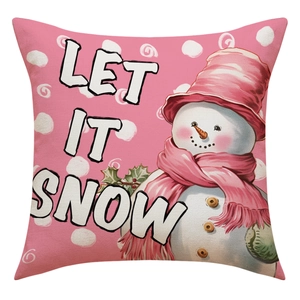 Détail de la taie d'oreiller de Noël en lin rose avec motif bonhomme de neige et texte