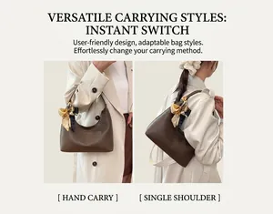 Detail of dark brown pebbled leather hobo bag with a decorative silk scarf on the handle