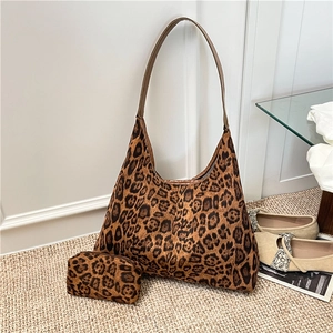 Retro leopard print tote bag with matching pouch on a cozy minimalist background