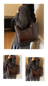 Close-up of dark brown wax leather tote with shiny texture and slim shoulder straps