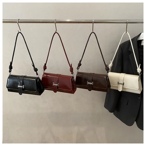 Chic underarm bags in black burgundy brown and cream with glossy finish and metal buckles