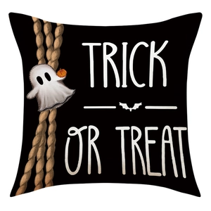 Detail of linen texture on Halloween throw pillow cover with Trick or Treat ghost print
