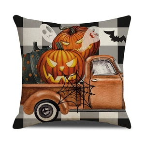 Detailed macro view of rustic linen Halloween pillowcase with vintage truck and pumpkin print