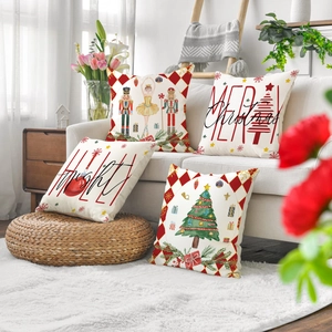 Set of 4 Christmas throw pillow covers with nutcracker and reindeer on white sofa