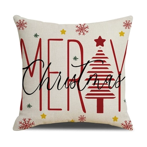 Macro shot of rustic Christmas cushion cover showing woven texture and festive tree print