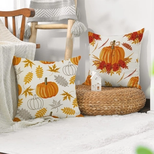 Detailed texture of autumn pumpkin and maple leaf prints on linen throw pillow covers