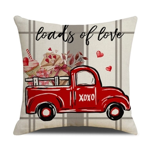 Detailed texture of linen cushion cover with red retro truck and loads of love print