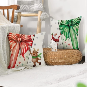 Set of two Christmas themed linen pillow covers featuring watercolor reindeer and Santa prints