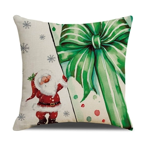 Detailed texture of linen Christmas pillowcase featuring Santa and green gift box print