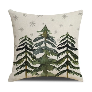 Close-up of linen-textured Christmas pillowcase with watercolor pine trees and snowflakes