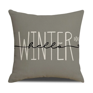 Detailed texture of linen winter pillowcase featuring hello WINTER text and snowflake