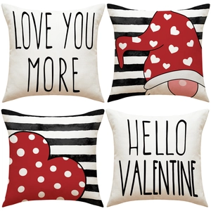 Detail view of four Valentine's pillow covers with gnomes and red heart patterns
