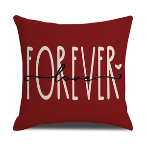 Detail of red Valentine's pillowcase with white FOREVER love text and cotton-linen texture