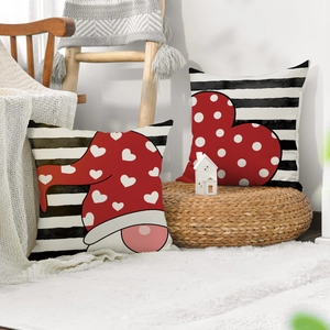 Set of two Valentine's heart and gnome pillow covers on black and white striped fabric