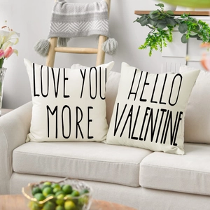 Linen texture pillow covers with LOVE YOU MORE and HELLO VALENTINE print in home setting