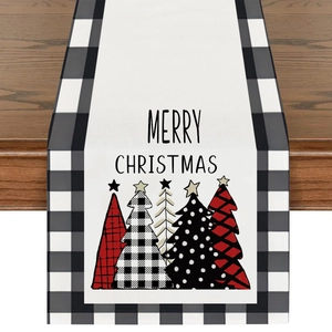 Detail of Christmas table runner with Merry Christmas text and buffalo plaid trees
