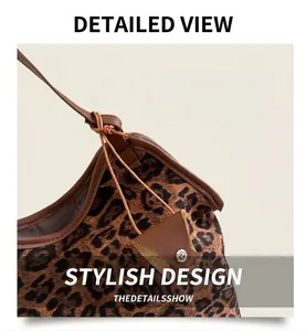Close-up of leopard print tote bag featuring brown leather trim and triangle tag detail