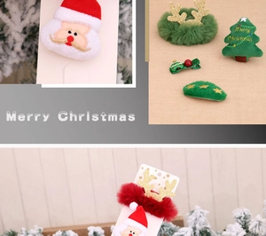Macro view of Christmas hair clips and plush scrunchies with Santa and reindeer motifs