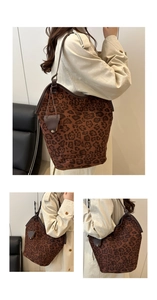 Three-way view of a stylish leopard print bucket bag with a slim shoulder strap
