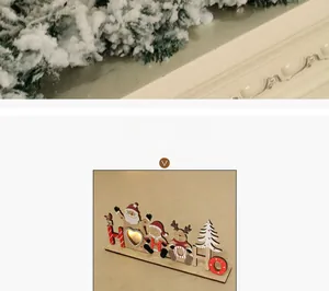Détail de l'ornement de Noël HOHO en bois avec LED et motifs découpés au laser
