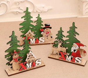 Three wooden Christmas desk ornaments featuring Santa, snowman, and reindeer figures