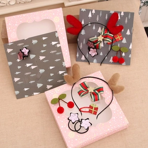 Christmas gift box set with festive reindeer headbands and shiny hair accessories