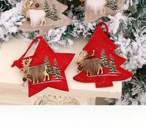 Detail display of Christmas reindeer embroidery on felt star and tree ornaments