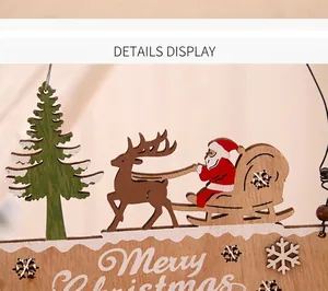 Detail of laser-cut wooden Merry Christmas hanging sign with Santa and reindeer