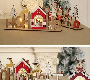 Détail de l'enseigne de Noël HO HO HO en bois découpé au laser avec LED et décorations