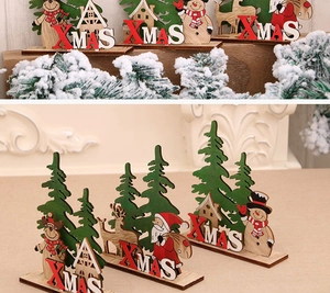 Detailed close-up of DIY wooden Christmas XMAS tabletop ornaments with colorful painted icons