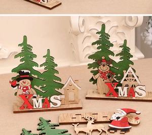 Close-up of wooden Christmas puzzle set with Santa, reindeer and XMAS letter house