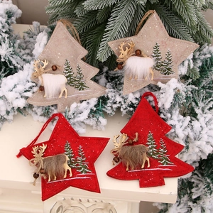 Set of four festive Christmas tree and star fabric ornaments with reindeer embroidery