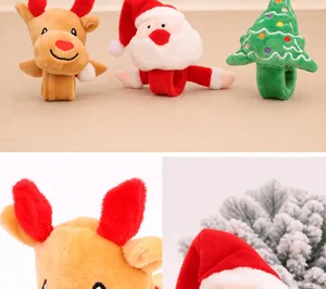 Macro detail of plush Christmas slap bracelets featuring Santa, reindeer and tree patterns
