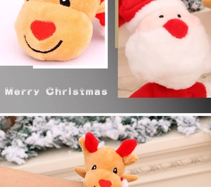 Detail showing plush Christmas slap bracelets featuring Santa and reindeer characters