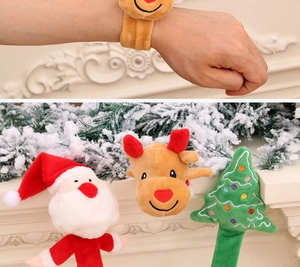 Detail of plush Christmas slap bracelets featuring Santa, reindeer, and tree designs
