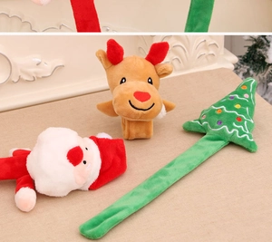 Close-up of Christmas plush slap bracelets featuring Santa, reindeer, and tree designs