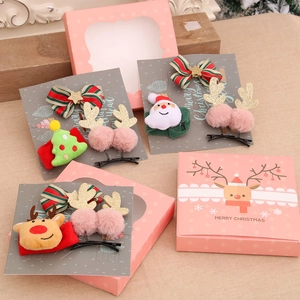 Coffret d'accessoires de Noël pour cheveux avec motifs renne et Père Noël en boîte rose